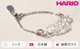 小さな粒々の集まりはマーキスカットという細長いダイヤモンドのような形。 光を拡散してガラスの輝きが増し、まばゆいきらめきが生まれます。 ＊ボールの部分をスライドし、チェーンの長さを調整できます ※ハン